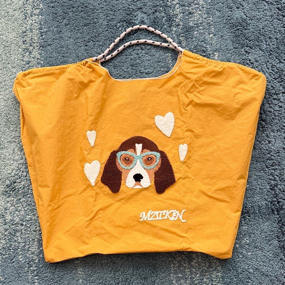 (New)Waterproof fabric an embroidered dog on the front
